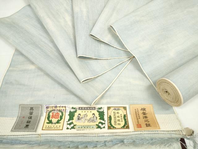 ■■■　サイズ　■■■ 長さ　　着尺分あり 幅　　　約37cm ■■■　商品詳細　■■■ 【正絹・未使用】 状態は接写画像のように表地所々・裏面所々に薄いシミ汚れがございます。 大変上質な逸品になります。 お安く出品致しますので、是非この機会にいかがでしょうか？ ■■■　注意事項　■■■ ■モニター発色の具合により色合いが異なる場合がございます。 ■寸法は多少の誤差が生じる場合がございますのでご了承ください。 ■縫込みの長さが左右非対称の場合は短い部分を記載しております。 左右非対称であってもご返品・お値引き等の保証は出来かねますので、ご了承の上ご購入をお願い致します。 ■シミ等のチェックには注意を払っておりますが、見落としがある場合もございますし、個人の見解も様々ですので神経質な方のご購入はお控えください。 ■箪笥に入っておりました着物や帯なので畳みシワや匂いがあるものもございます。 ■お休みは基本的に土日祝となりますが、その他臨時でお休みする場合がございますのでご了承ください。 ■商品の発送は平日のみの発送となります。 ■夜間と土曜、日曜日はお問い合わせの回答が遅れる場合がございます。 ■当店では、お直し、紋入れ、お手入れ等は承っておりません。 ■生地の状態（ヤケ、経年劣化等）によってはサイズ直しが出来ない場合がございます。 その点もどうかご了承のうえ、ご購入をお願いいたします。 ■弊社で取り扱う商品は一点ものにつき、時期や在庫状況に応じて金額が変更となる場合がございます。 ■検針は行っておりません。予めご了承いただきますようお願いいたします。 ■【洗える着物】と記載のある商品におきましては、商品お届け後に洗濯を行ってしまってからのご返品にはご対応しかねます。 念の為、専門店でのお手入れをお願いいたします。 ■写真に写っている物が全てになります。それ以外の付属品はございませんのでご了承ください。 ■状態に関する写真につきましては、掲載可能な写真枚数に限りがあるため、各箇所につき1枚参考画像を掲載しております。 ■着物のサイズ目安は下記を参考ください↓ ＜女性着物＞　お端折り次第で＋5cm　－1cmが着用可能サイズ 　例）身丈170cmの場合、身長160cm～175cm ＜男性着物＞　身丈＋約25cm～27cm程が適応身長 　例）身丈155cmの場合、身長180～182cm