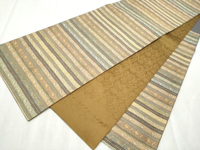 ■■■　サイズ　■■■ 長さ 440cm 幅 30.5cm程 ■■■　商品詳細　■■■ 【正絹】 状態は締めてはおりますが 特に目立ったシミ汚れなどもなく大変良い状態です。 大変上質な逸品になります。 お安く出品致しますので、是非この機会にいかがでしょうか？ ■■■　注意事項　■■■ ■モニター発色の具合により色合いが異なる場合がございます。 ■寸法は多少の誤差が生じる場合がございますのでご了承ください。 ■縫込みの長さが左右非対称の場合は短い部分を記載しております。 左右非対称であってもご返品・お値引き等の保証は出来かねますので、ご了承の上ご購入をお願い致します。 ■シミ等のチェックには注意を払っておりますが、見落としがある場合もございますし、個人の見解も様々ですので神経質な方のご購入はお控えください。 ■箪笥に入っておりました着物や帯なので畳みシワや匂いがあるものもございます。 ■お休みは基本的に土日祝となりますが、その他臨時でお休みする場合がございますのでご了承ください。 ■商品の発送は平日のみの発送となります。 ■夜間と土曜、日曜日はお問い合わせの回答が遅れる場合がございます。 ■当店では、お直し、紋入れ、お手入れ等は承っておりません。 ■生地の状態（ヤケ、経年劣化等）によってはサイズ直しが出来ない場合がございます。 その点もどうかご了承のうえ、ご購入をお願いいたします。 ■弊社で取り扱う商品は一点ものにつき、時期や在庫状況に応じて金額が変更となる場合がございます。 ■検針は行っておりません。予めご了承いただきますようお願いいたします。 ■【洗える着物】と記載のある商品におきましては、商品お届け後に洗濯を行ってしまってからのご返品にはご対応しかねます。 念の為、専門店でのお手入れをお願いいたします。 ■着物のサイズ目安は下記を参考ください↓ ＜女性着物＞　お端折り次第で＋5cm　−1cmが着用可能サイズ 　例）身丈170cmの場合、身長160cm〜175cm ＜男性着物＞　身丈＋約25cm〜27cm程が適応身長 　例）身丈155cmの場合、身長180〜182cm