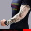 タトゥー柄がプリントされた御洒落なアームカバー。グリーンとブラックのグラデーションカラーのTATOO　SLEEVE.。アメリカンデザインのセクシー美女のデザイン。【メール便可1】☆タトゥーアームカバー/アームカバー/タトゥーカバー　/タトゥーシール/タトゥースリーブ/