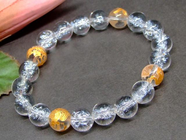 63211　　ヒマラヤ クラック水晶 四神 水晶 金彫り 10mm A ブレスレット 内径17cm ポーチ付き クリスタ..