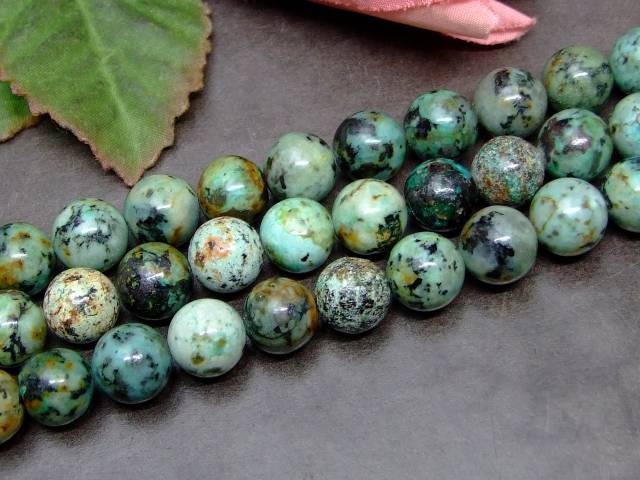 g3-333F　　今月40％OFF アフリカンターコイズ 10mm 1連38cm 通し針、解説書、1mゴム付き 送料無料 天然石 パワーストーン