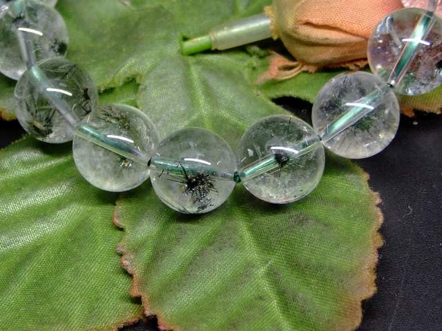 65484　　ホーランダイトインクォーツ 12mm 5A ブレスレット 内径17cm ポーチ付き ホランド鉱インクォーツ 星入り水晶 ウニ入り水晶 送料無料 マダガスカル産 天然石 パワーストーン