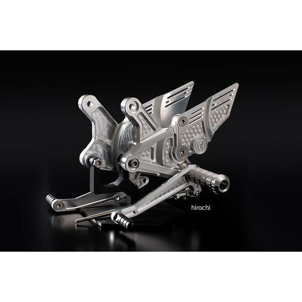 ピーエムシー PMC ARCHI ビレットハニカムバックステップ Premium 18年-25年 Z900RS/CAFE/SE シルバー18年-25年 Z900RS/CAFE/SEカラー：シルバーポジション：1ポジション 純正比BACK 30mm/UP 30mmペダル部：ダブルベアリング仕様でスムースなペダル操作を実現材質：メインプレート・ヒールプレート：A6061材ペダルバー：POM材ペダル：転倒時の操作不良を防ぐ別軸構造ARCHIビレットハニカムバックステップをベースに、緻密な切削デザインを随所に落とし込んだフルマシニング仕様のバックステップ。ベースプレートからペダルチップまで徹底的に削り込み、計算された肉抜きと重なる切削痕が、純正とは一線を画す圧倒的な存在感を生み出します。メインプレートは剛性を高めるため、ビッグブロックから削り出しカラーやボルトを使用しない一体構造のため、ストレスを感じない高い剛性感で安心してライディングに集中していただけます。純正比BACK 30mm/UP 30mm。ARCHIが導き出した、最も気持ちよく、最も美しく乗れるポジションです。189-5572楽天 HD店
