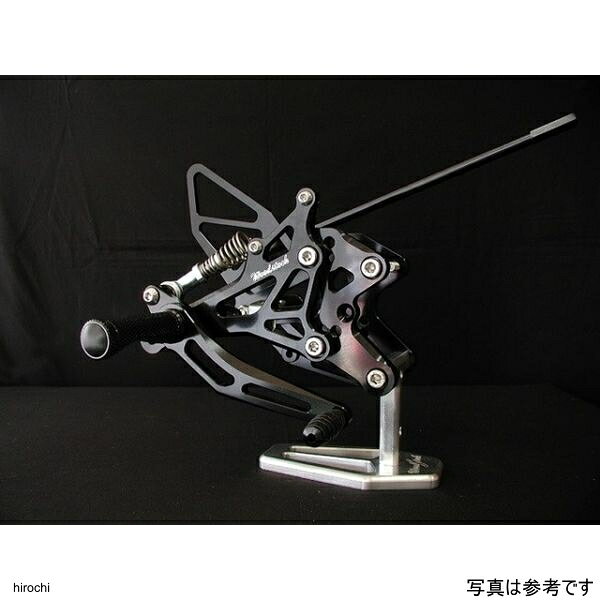 ウッドストック YZF-R6 バックステップキット オールシルバー06年-08年 ヤマハ YZF-R6カラー：オールシルバーポジション：4P・0mmBack/20mmUp・0mmBack/30mmUp・10mmBack/20mmUp・10mmBack/30mmUp逆チェンジ：可ブレーキスイッチ：純正マシンを思いのままに、自由に操る。その為に、最も重要なポイントは「ポジション」にあるとウッドストックは考えます。当製品を含めすべて、実際にまたがり何度もポジションを確認して商品化されております。全日本選手権など数々のロードレースの実践を通じて磨かれた操作性の高さをぜひご体感ください。WBS-Y07-SL楽天 JP店