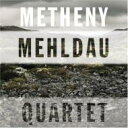 出荷目安の詳細はこちら商品説明Metheny / Mehldau　プロジェクト第2弾はカルテットによる11曲を収録。お互いを埋めあうよなコラボレイションはその音楽の可能性を2倍以上に高めた！アルバム第一弾『Metheny Mehldau』は、手探り状態から次第に姿を現す2人のコラボレイションが印象的だったが、本作はパット・メセニーがブラッド・メルドーのトリオを飲み込むという形でコラボレイションを開始。どの曲も前作以上の緊密な音の交流が流れている。ベーシスト、Larry Grenadierを“共有”する2人のミュージジシャン。そうした見方からすれば、グレナディアを中心としてメセニー＝メルドーが歩み寄って作られたカルテット。しかし、実際の演奏の中では、丁々発止のやり取りやテンション溢れる“ヘゲモニー争い”もある（？！）。　メルドーが展開してきた“ニュービート”によるメインストリーム・ジャズの未来を、全く違うアプローチながら、80年代から追求してきたメセニーとの共演によってより確実なものにしたのだろうか。その答えは第3作を待たねばならないのだろうか？いずれにしても、いままでのスケール感をさらに上回る多期ナ世界を提示したメセニー。ブラッド・メルドーを中継点としてピアノジャズ派もファンをも取り込んでいくかもしれない。基本的には、Brad Mehldau TrioにPat Methenyが加わりながら、Pat=Grenadierのリズムが次第に勢いを増しながらカルテットの密度がアップしていく。メセニー自身に関して言えば、あえて、アコースティックな演奏を避け、メルドーの音色(ねいろ）、響に埋没することから逃れている。強かなメセニーとサウンド全体を見通す優れた音楽観が伝わってくる。　Pat Metheny (g) Brad Mehldau (p) Larry Grenadier (b) Jeff Ballard (ds)曲目リストDisc11.Night Away/2.Sound Of Water/3.Fear And Trembling/4.Don't Wait/5.Towards The Light/6.Long Before/7.En La Tierra Que No Olvida/8.Santa Cruz Slacker/9.Secret Beach/10.Silent Movie/11.Marta's Theme (Passagio Per Il Paradiso)