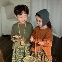 【送料無料】春の新作子供用不規則な長袖Tシャツ、メンズとレディースのベビースリットスプライシングスウェットシャツトレンディ