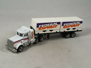 【送料無料】ホビー　模型車　車　レーシングカー matchbox convoi peterbilt duble conteneur camion fedaral express macao