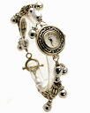 yzrv@Be[WAeB[NbNuXbgnMO`[AiOwomens vintage antique look bracelet with hanging charm analogue watch