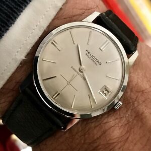 腕時計　オロロギウォッチフェリシタスヌーシャテルアンニカリカマニュアルヴィンテージorologio watch felicitas neuchatel anni 70 carica manuale vintage nos date