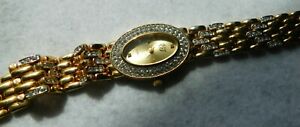 【送料無料】腕時計　ブレスレットゴールドラインストーンエンブレムバッテリーbracelet wrist watch gold tn rhinestones 8 emblem signed eg ej * battery