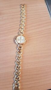 【送料無料】腕時計　トレスジョリーモントルフェムeフォンピオンネtres jolie montre femme kelia en tres bel etat fonctionne