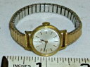 yzrv@eB\S[htBhAfREhfB[Xtissot gold filled art deco round ladies wristwatch