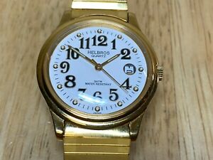 【送料無料】腕時計　ヴィンテージヘルブロスメンズゴールドトーンアナログクォーツウォッチバットvintage helbros mens easy read gold tone analog quartz watch hours~date~ batt
