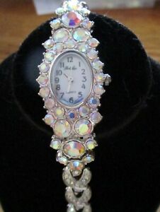 【送料無料】腕時計　パークレーンウォッチレディーススパークリングクリスタルシルバーストーンズモップpark lane watch ladies sparkling crystals silver w iridescent stones 85 mop