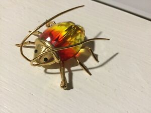 ジュエリー・アクセサリー ブローチメッキゴールドスワロフスキーsublime broche plaque or insecte veritable swarovski