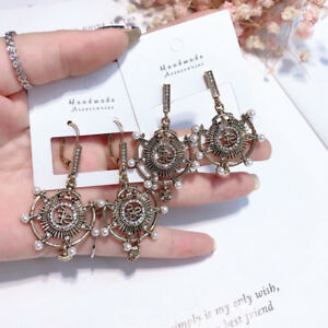 hokushinの【送料無料】ジュエリー・アクセサリー ゴールデンスリーパーイヤリングアールデコテテデモートパールboucles doreilles dormeuse dore ancre art deco tete de mort perle aa27｜アングル3