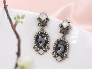 【送料無料】ジュエリー・アクセサリー イヤリングクーラスドレグートアールデコベージュグレーヴィン..