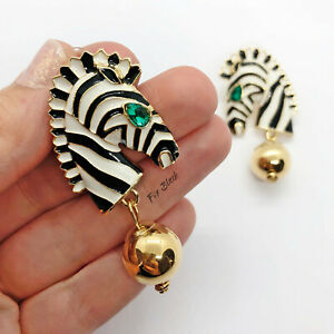 【送料無料】ジュエリー・アクセサリー シマウマステートメントラインストーンイヤリングデザイナーブログzebra animale smalto dichiarazione strass orecchini pendenti uk runway designer blog