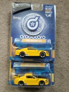 【送料無料】模型車 モデルカー ホットホイールドロップスターズマスタングイエローパッケージレア