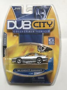 【送料無料】模型車 モデルカー ジェイダトイズダブシティシェビーカマロシルバーjada toys dub city 1985 chevy camaro 164 w15 165 silver 75