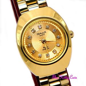 【送料無料】腕時計　ウォッチデザイナークリスタルドレスレディースクラシックdesigner classic omax ladies waterproof gold plated crystal dress watch wp3900