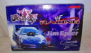 【送料無料】模型車　モデルカー　スポーツカーアクションスケールジムポンティアック2000 action 124 scale jim epler wwf undertaker pontiac firebird funny car