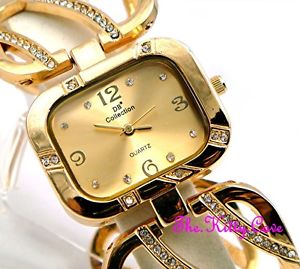 【送料無料】gold plated designer wide wavy bars dress cage watch w swarovski crystal bling