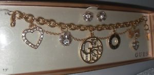 【送料無料】 guess bracelet with earrings goldcry color 75