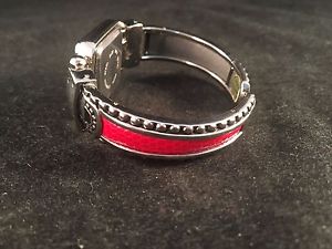 【送料無料】cannes womens silver tone red accented cuff watch