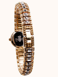 【送料無料】cannaswomens full stones gold finish round case and links analog quartz watch