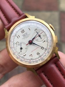 【送料無料】腕時計 ウォッチ ヴィンテージクロノグラフスイスファンシーラグreloj para hombres con crongrafo vintage britix chapado en oro suizo 35,3mm fancy lugs