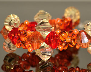 【送料無料】ブレスレット アクセサリ— オレンジexclusive, handmade orange and soft yellow clasped bracelet