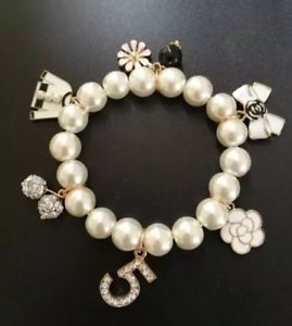 【送料無料】ブレスレット アクセサリ- パールクリスタルジャケットデザイナーゴールドストレッチブレスレット