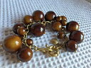 yzuXbg@ANZT?@7juXbgEhj crew bracelet round beads dangling brown sphere 7