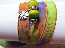 【送料無料】ブレスレット　アクセサリ—　クローバ4オレンジドアgreen purple orange bracelet silk shade handicraft clover 4 leaves door