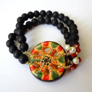 【送料無料】ブレスレット　アクセサリ—　ゴールドトーンブレスレットシチリアカートホイールwomens gold tone bracelet lava stone, red coral and sicilian cart wheel 35 aa