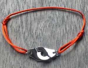 【送料無料】ブレスレット　アクセサリ—　コードオレンジシルクサテンシルバースチールブレスレットhandcuffs silver steelbracelet on..