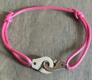 【送料無料】ブレスレット　アクセサリ—　コードピンクボンボンスチールエージェントブレスレットhandcuffs steel agentbracelet on cotton cord pink bonbon