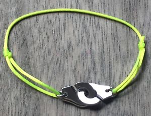 楽天hokushin【送料無料】ブレスレット　アクセサリ—　コードネオンイエローシルバースチールブレスレットhandcuffs silver steelbracelet on cord neon yellow women men kids