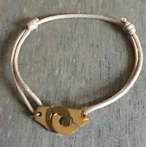 【送料無料】ブレスレット アクセサリ— ベージュコードスチールゴールドモードブレスレットbracelet handcuffs on beige cotton cord adjustable steel gold mode 【送料無料】ブレスレット アクセサリ— ベージュコードスチールゴールドモードブレスレットbracelet handcuffs on beige cotton cord adjustable steel gold mode