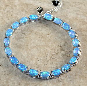 【送料無料】ブレスレット アクセサリ— ファイアーオパールブレスレットsilver elegant blue fire opal oval brac...