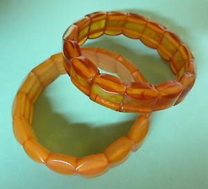 yzuXbg@ANZT?@S}EguXbgIWj148two bracelets resin ambermounted on rubber