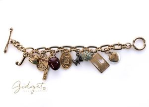 【送料無料】ブレスレット アクセサリ— ジューシークチュールゴールドトーンビンテージブレスレットjuicy couture gold tone vintage prefixed charm bracelet with 10 charms