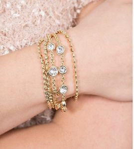 ブレスレット　アクセサリ—　ストラップゴールドクリスタルコレクションguess ubb84131s wrist strap in colour goldcrystal collection