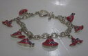 yzuXbg@ANZT?@Be[WbhnbguXbgp[vg`F[NRX`[WG[vintage red hat lady charm bracelet, purple trim, chain link, costume jewelry