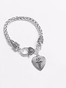 【送料無料】ブレスレット アクセサリ— ブレスレットnurse practitioner np charm bracelet heart caduc...