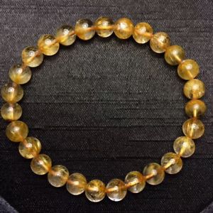 66mm natural gold sunflower rutilated quartz stretch crystal beads braceletゴールドルチルクリスタルビーズストレッチブレスレット※注意※NYからの配送になりますので2週間前後お時間をいただきます。人気の商品は在庫が無い場合がございます。ご了承くださいませ。サイズの種類の商品は購入時の備考欄にご希望のサイズをご記載ください。　携帯メールでの登録ですと楽天からのメールが届かない場合がございます。