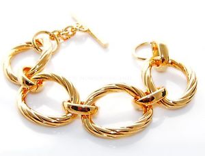 イタリアン　ブレスレット　ブロンズイエローゴールドカートンマジェスティックカフmaestoso bracciale donna ovali a torchon in bronzo e oro giallo 18kt astuccio