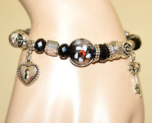 yzC^A@uXbg@JtubNVo[y_gbracciale donna nero argento ciondoli cristalli a molla elastico ragazza cc5