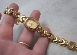 ̵ӻסӥơå˥ȡ󥴡ɥСvintage oleg cassini ladys wrist watch two tone gold, silver